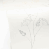 Le papier peint Little Graminea de la collection Art of Botanty par Caselio représente des petites fleurs aux traits fins et délicats.