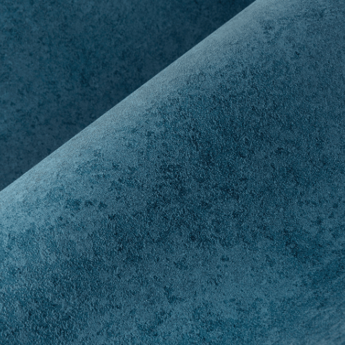 Le papier peint Stuc Calcaire, issu de la collection Essentiels Kaolin signée Arte, reproduit à la perfection l’effet d’un stuc texturé au sable.